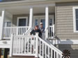 Our happy home owners on the porch entry to their new modular home.