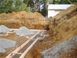 Forms poured to start the crawl space foundation for a ranch style modular home