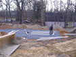 Beginning of a septic system being installed in Monmouth County using PVC piling & stone