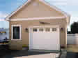 RBA built detached single car garage designed with an extra room off to one side for storage