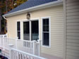 Rear decks with sliding glass doors and vinyl railings are all convenient maintenance free features 