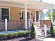 Large porches with rounded columns are typical features of New Jersey shore homes