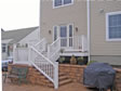 A rear deck and landscaping was custom designed just for this Monmouth County, Manasquan, NJ modular home.