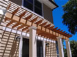 Building a Pergola over a rear deck provides shade, beauty and privacy to any backyard 