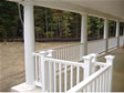 An oversized deck, long porch and thick columns all add function and beauty to this Millstone, NJ home