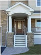 Elegant and inviting front porch entry lead to the front door of this Monmouth County, Monmouth Beach, NJ home