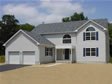 Monmouth County, Neptune, NJ site-built colonial with integral 2-car garage and storage above