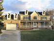 North New Jersey custom colonial with stone façade and garage dormers