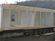 Cross section view of the mate wall section of a modular home still on the carriers 