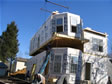 Front view of the last modular section being installed in Oceanport, NJ
