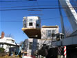 Crane lifting a 20,000 lb. second floor modular home section into position 