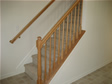 Traditional staircase and landing are shown in the Monmouth county, NJ modular home