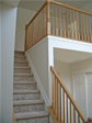 Traditional set of stairs and oak railing in this Monmouth County, Neptune, NJ modular home