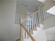 This colonial features an oak stairs, which leads to a balcony overlooking the first floor foyer entryway 