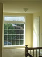Placing a large window in the 2nd floor foyer adds light and a wonderful focal point to any hallway