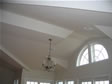 Half circle windows are placed high into the cathedral ceiling of this Monmouth County, Monmouth Beach, NJ home