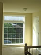 Placing a large window in the 2nd floor foyer adds light and a wonderful focal point to any hallway